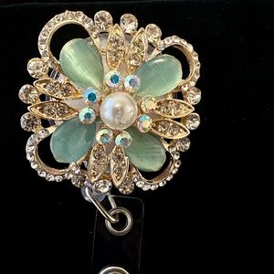 Gold and Green Crystal Floral Badge Reel